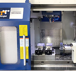 Four axis machining center